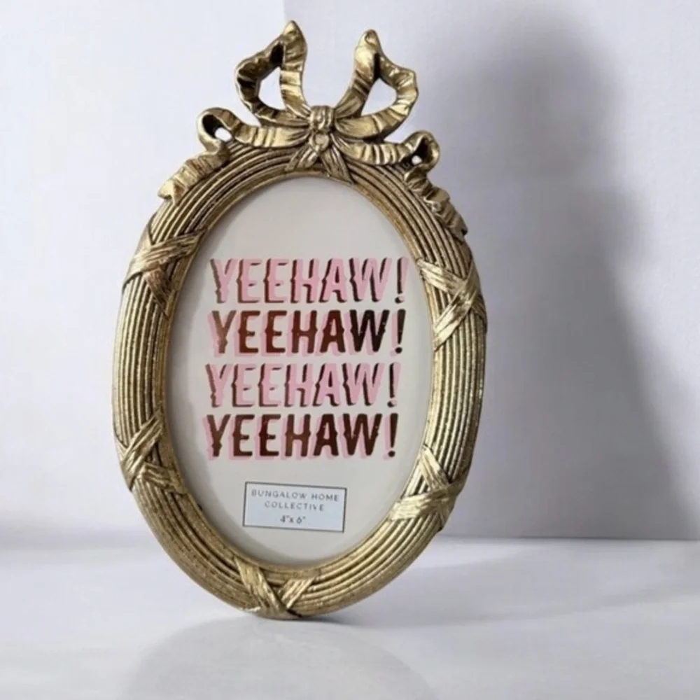 Gold Oval Frame with bow on top antique style  4”x6”